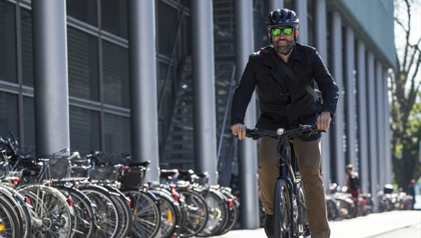 Commute riding an E Bike through the city